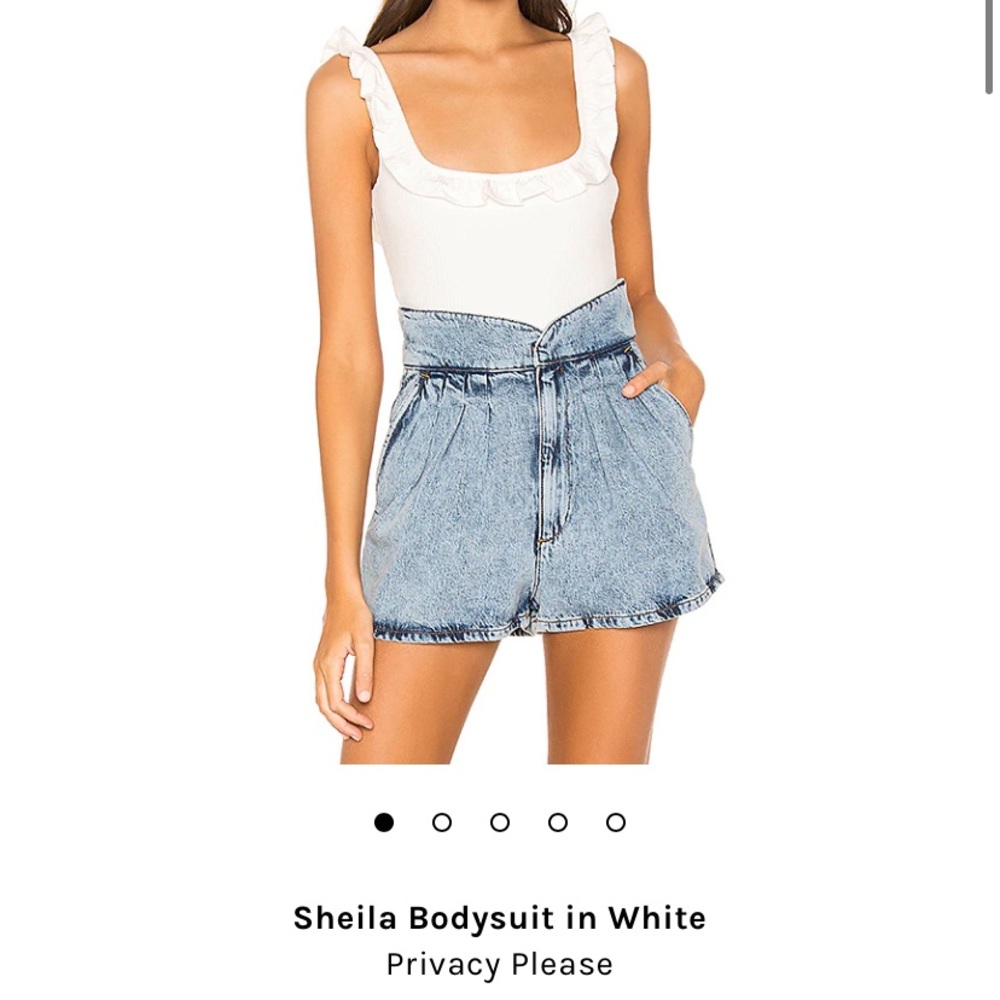 NWOT ruffle detailed bodysuit in black